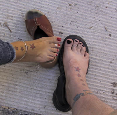 toe ring tattoos designs. 2Adults-1Child - Sawdust Festival